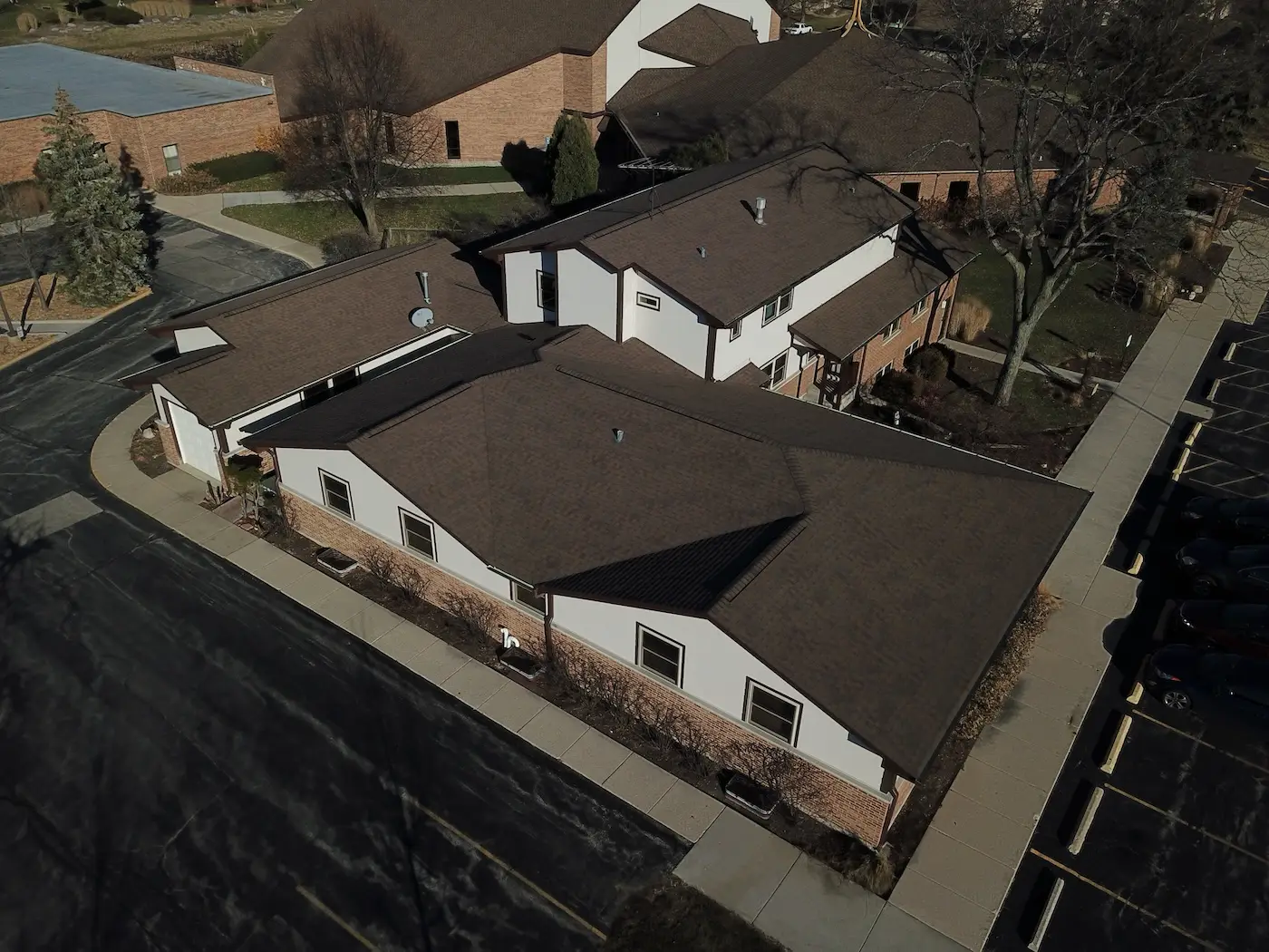 Rose Rock Roofing professional commercial roofing system on small business building