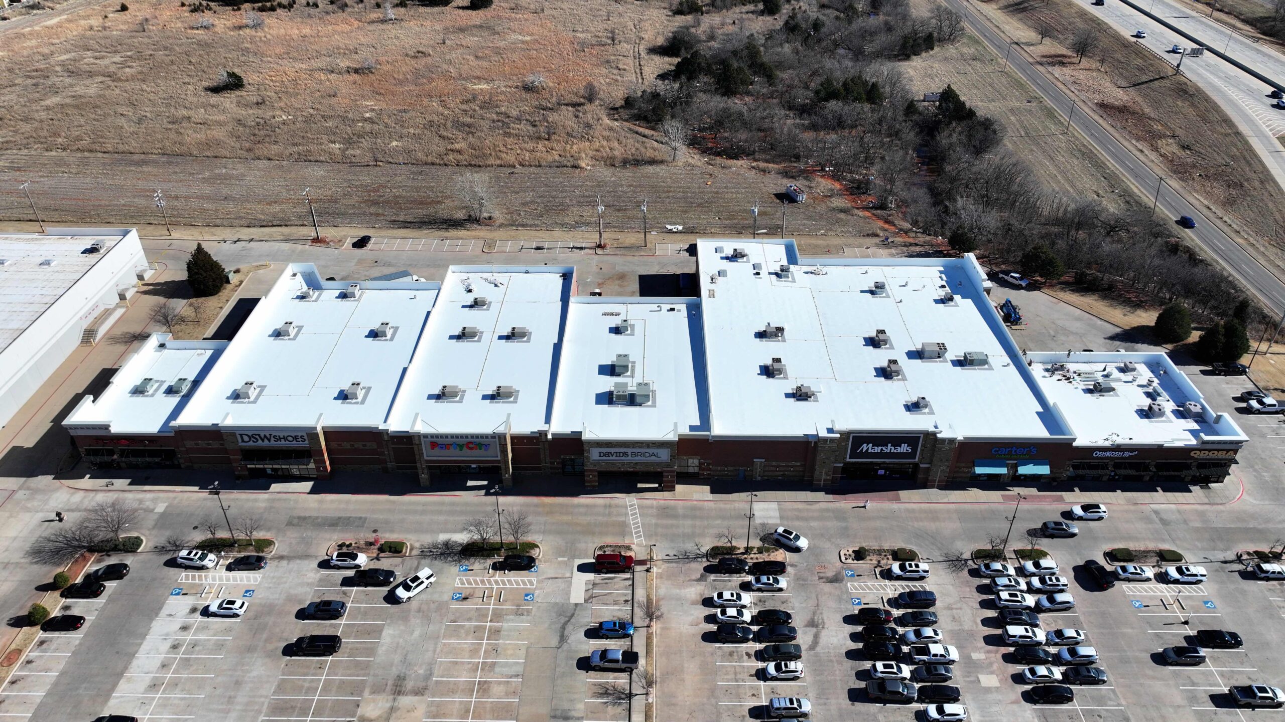 Rose Rock Roofing small commercial flat roof installation with clean membrane system